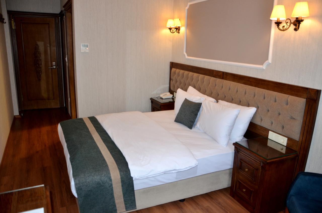 아흐메트 에펜디 코나기 호텔 이스탄불 외부 사진 A bed